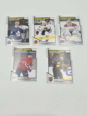 2020-21 Upper Deck Series 2 O-Pee-Chee Marquee Rookies  Coghlan Woll - Image 1 of 4