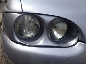 2x Morette Scheinwerfer Einsatz NEU Ford Escort RS Cosworth 5. 6. 7. Generation - Bild 1 von 2