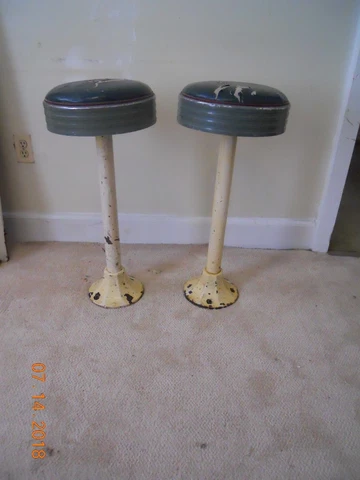 vintage cast iron swivel bar/soda fountain stools  $200.00 pair/ $125.00 each Cover