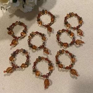 8 plastic beaded Amber orange tableware vintage napkin rings 3"x2" Boho kitchen - Picture 1 of 11