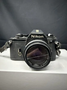 Nikon EM SLR 35mm Film Camera 50 mm & Zoom Lens Series E Black Vintage - Picture 1 of 13