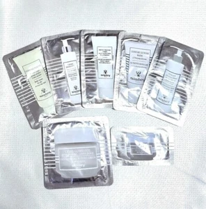 7 Sisley samples - eye and lip contour balm, cleansing milk, buffing, body cream - Picture 1 of 1