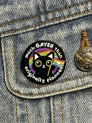 ‘Much Gayer Than Originally Planned’ Funny Cute LGBTQ Rainbow Cat Enamel Pin - Image 1 of 4