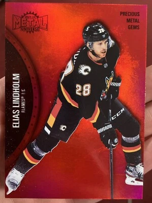 2021-22 Skybox Metal Universe Alternate Jersey PMG Red /100 Elias Lindholm #136 - Image 1 of 2