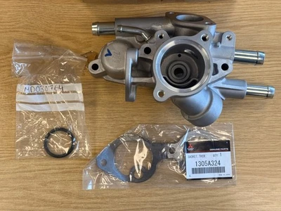 Marco termostático Mitsubishi Outlander GGW GFW ZJ GG3W 1305A449 genuino NUEVO Foto 1 de 4