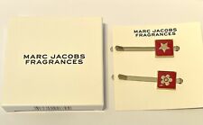 Marc Jacobs pair of gold metal with red motif hair clip / grips - boxed