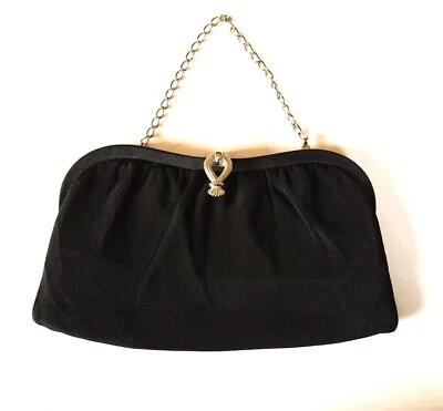 Bolso sin asas de tela negro con cadena escondida tono plata noche Foto 1 de 4