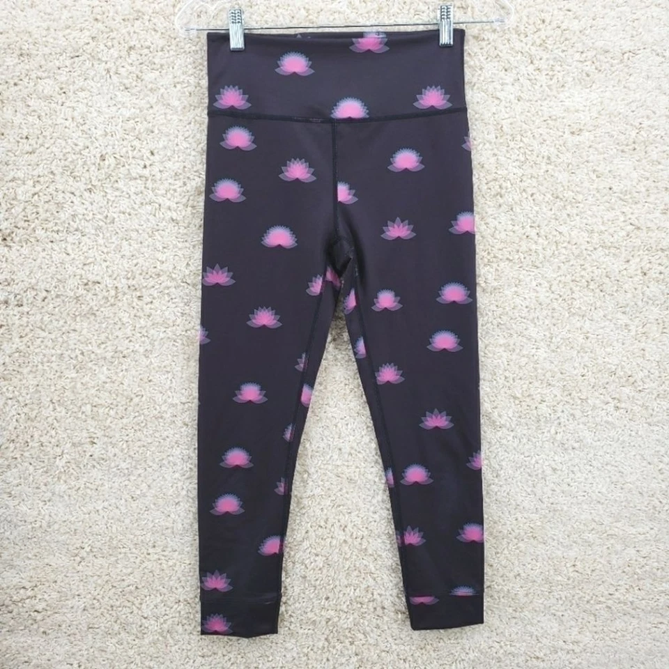 𝅺FP Movement Free People women US Small black leggings pink lotus flowers poly - Image 1 of 4