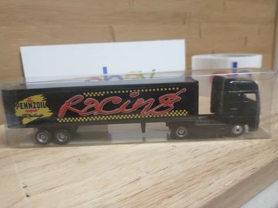 Литой под давлением гоночный трактор и прицеп Pennzoil Golden Wheel Inc. 1:87 грузовик MAN - Изображение 1 из 4