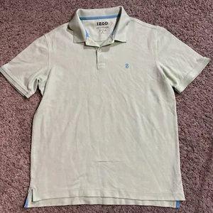 Camisa polo verde Izod Advantage Performance para hombre mediana manga corta elástica - Imagen 1 de 12