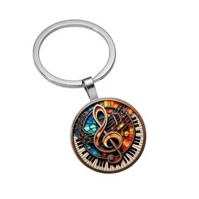 Porte-clés, bijou de sac cabochon clé de sol, clavier piano et notes musique. - Photo 1/4