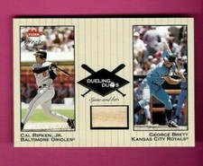 GEORGE BRETT + CAL RIPKEN JR 2002 FLEER DUELING DUOS BAT RELIC (BRETT) #DD-GB3