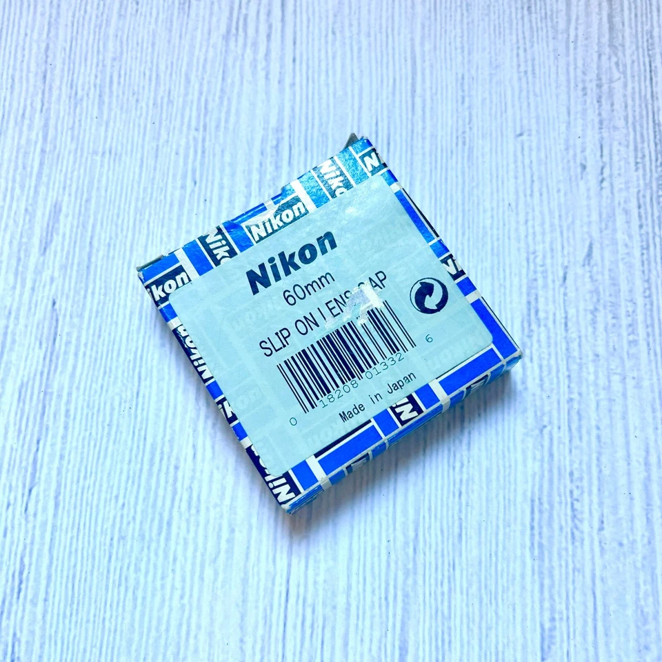 BRAND NEW - Nikon 60mm Slip on lens cap - Image 1 of 1