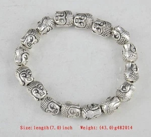 Tibet Silver Buddha Heard Chinese Old Handwork Amulet Elastic Bracelet - Picture 1 of 4