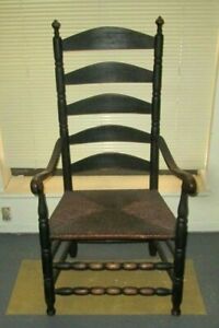 ANTIQUE AMERICAN LADDER BACK  ARMCHAIR IN BLACK PAINT RUSH SEAT CIRCA 1740-1760