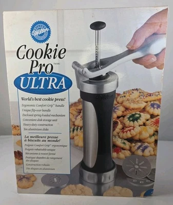 Prensa de galletas Wilton Cookie Pro Ultra resistente 10 discos de aluminio con almacenamiento Foto 1 de 4