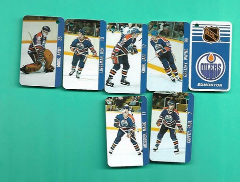 (7) EDMONTON OILERS NHL HOCKEY 1983-84 KEY CHAIN PLATES  (V5335) Cover
