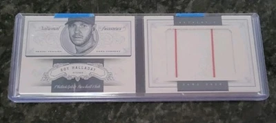 Roy Halladay 2012 National Treasures Relic Booklet 66/99 - Image 1 of 2