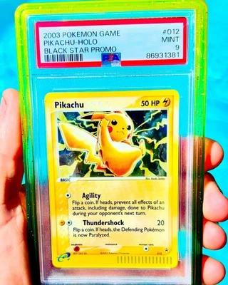 2003 Pokémon PSA 9 Pikachu HOLO⚡️🐱w/ SWIRL 🌀- 012 - AND VOLTAGE 🔌 GRADEDGUARD - Image 1 of 4