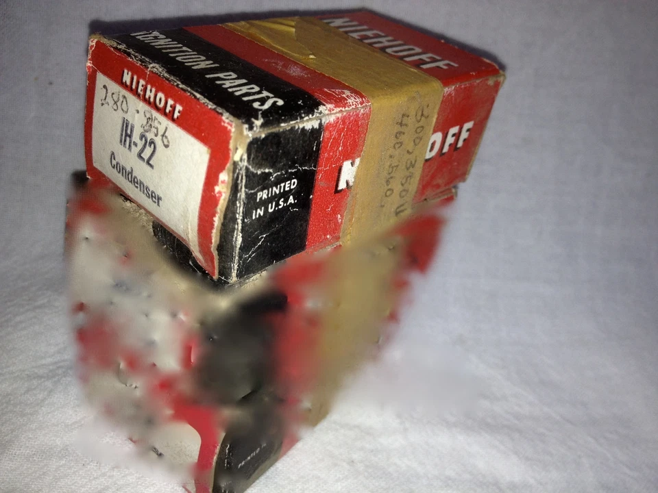 International Harvester ignition condenser.   Niehoff IH22.   Item:  2128 - Image 1 of 1