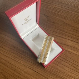 ENCENDEDOR CARTIER GRANDE OVALADO MUST SANTOS TOTALMENTE FUNCIONAL VINTAGE - Imagen 1 de 9