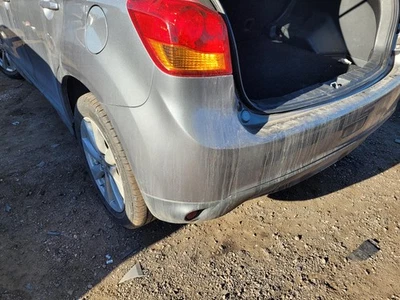 Conjunto de parachoques trasero usado para: Mitsubishi Outlander Sport 2015 sin estacionamiento como Foto 1 de 4