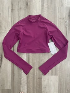 NUEVO CON ETIQUETAS Camiseta Elíptica Athleta Ultra Corta Talla XS Manga Larga Yoga Gimnasio Camisa Fucsia  - Imagen 1 de 8