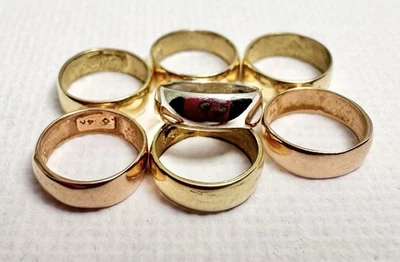 7 anillos colgantes de oro de 14k multicolor de 1,80 gramos Foto 1 de 4