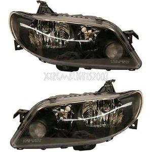MAZDA PROTEGE 5 2002 2003 BLACK HEADLIGHTS HEAD LIGHTS FRONT LAMPS PAIR SET - Picture 1 of 1