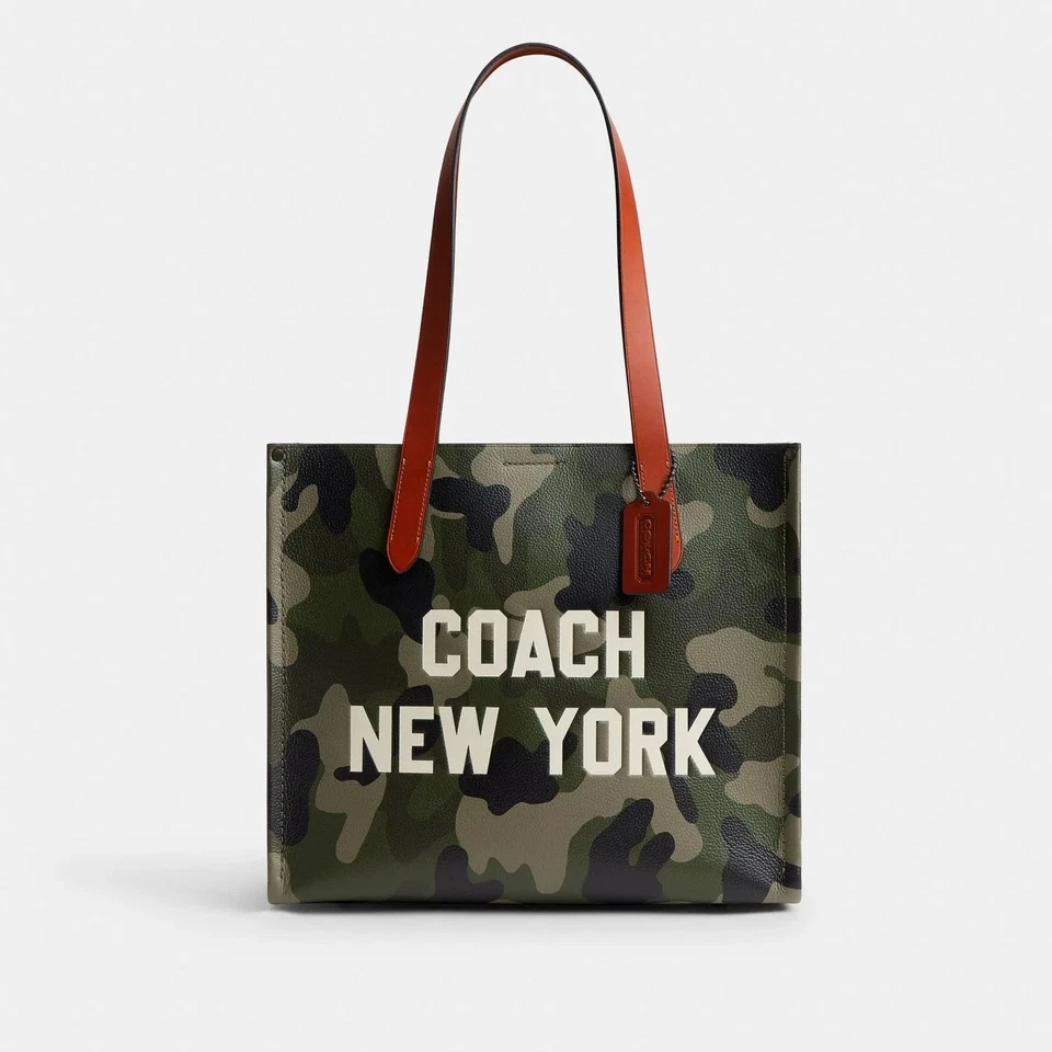 Auténtico bolso de mano Coach Relay con estampado de camuflaje y gráfico Coach CY808 G1N con etiquetas Foto 1 de 1