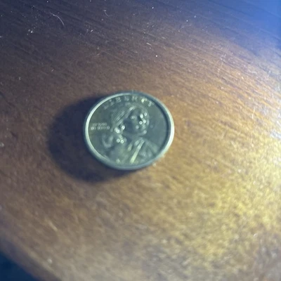 SACAGAWEA  DOLLAR  COIN (ERROR) NO YEAR, No Mint, No Edge inscription - Image 1 of 4