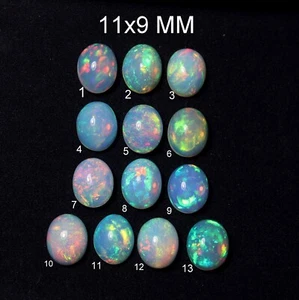 11x9 MM Natural AAAA Grade Rainbow Multi Flashy Fire Ethiopian Opal Oval Cabs - Picture 1 of 9