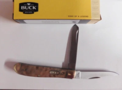 Buck Knifes Edge Of A Legend TRAPPER 0382BWSWM-B