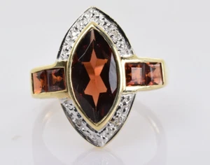 Garnet and Diamond Accent Ring in 10k Yellow Gold 3.02 Carats Size 7 - Picture 1 of 4