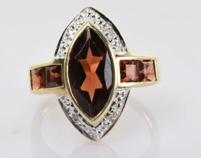 Garnet and Diamond Accent Ring in 10k Yellow Gold 3.02 Carats Size 7 - Image 1 of 4