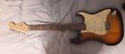 electric guitar and amp (Squier strat) one minor scuff, bag strap and picks incl