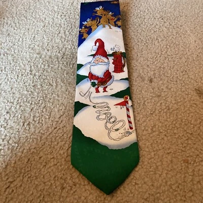 Sello Yule Greetings - Corbata azul con Papá Noel jugando al golf en la nieve Foto 1 de 4