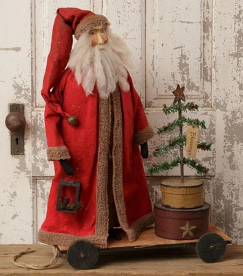 Carrito grande primitivo de Papá Noel en madera con cajas de anidación y árbol de plumas Foto 1 de 4