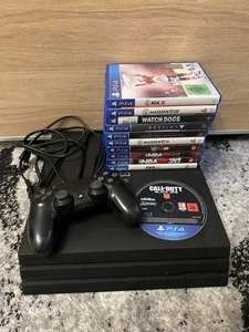 Sony PlayStation 4 Pro – mit Controller und 10 Spielen Gebrauchter Zustand - Bild 1 von 15