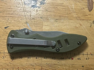 Camillus Titanium Clip Point Liner Lock - Cuchillo EDC Verde Foto 1 de 4