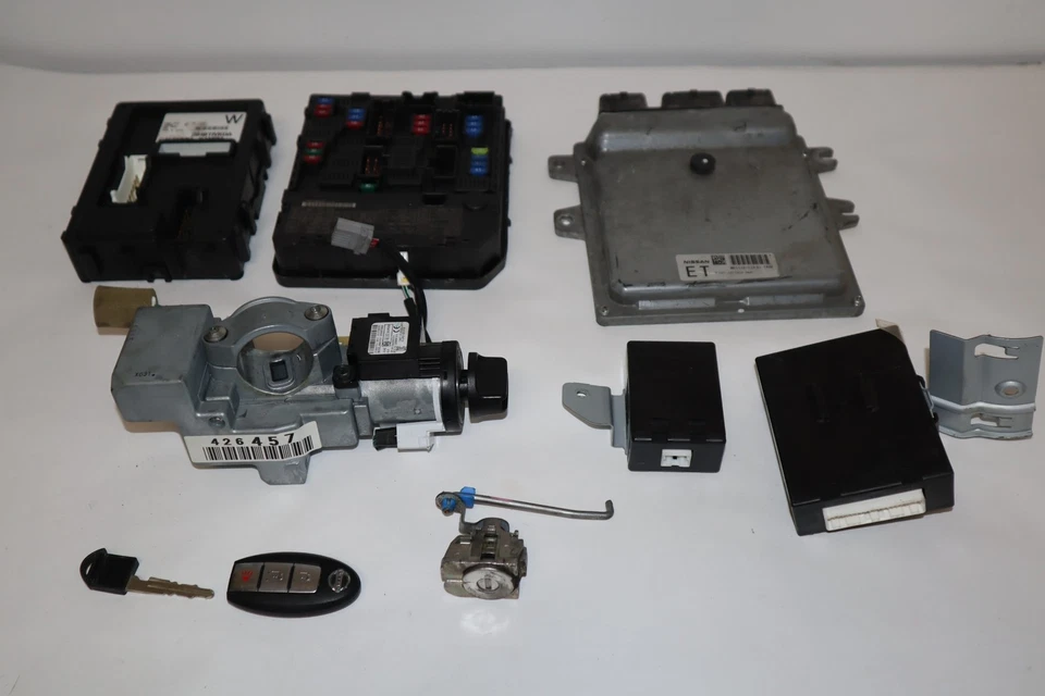 2012 NISSAN ROGUE - ECU BCM KEY LOCK CYLINDER IMMOBILIZER SET - ECU DENTED - Image 1 of 4