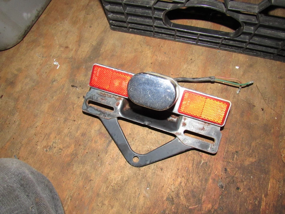 1986 honda vf700 c v45 magna license plate light and bracket - Image 1 of 1