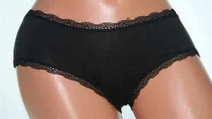 Braguita de bikini negra con detalles florales en cintura y bandas para las piernas talla M - Imagen 1 de 2