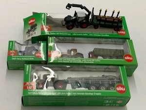 Siku 1:87 1827 Claas mit Faßwagen, 1855 JCB mit Hakenliftmulde in OVP - Bild 1 von 5