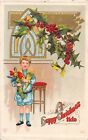 1911 Christmas Postcard of Holly Over Cute Little Boy With Toys & Stocking - 794