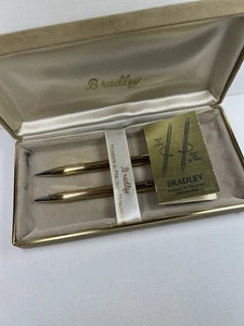 Juego de bolígrafos y lápices Bradley vintage FUNCIONANDO caja de terciopelo tono dorado - Imagen 1 de 5