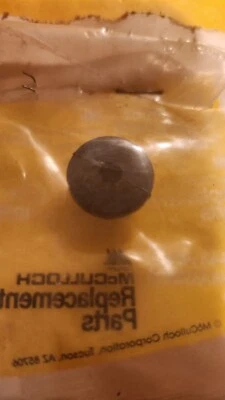Genuine NOS NLA McCulloch Single Hole Fuel Grommet 236321  [7839E] - Image 1 of 4