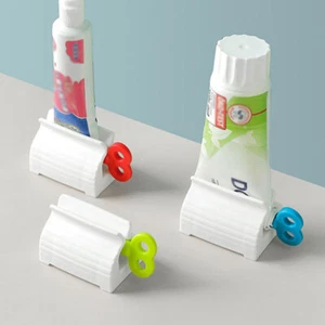Rolling Tube Toothpaste Squeezer Toothpaste Easy Dispenser Seat Holder Stand UK - Picture 1 of 24