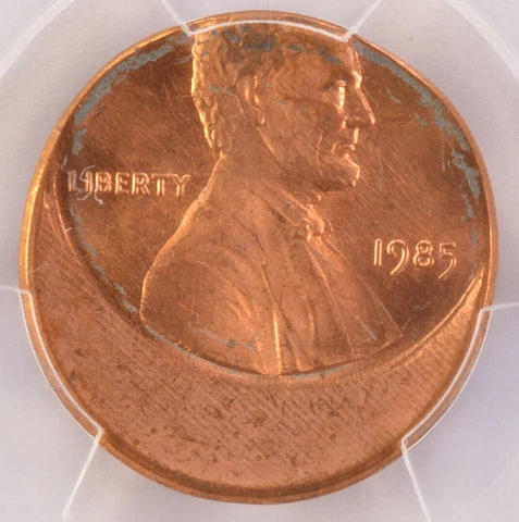 1985 PCGS 1c incoln Cent Struck 25% Off-Center at K-1 MS65 Red Cover