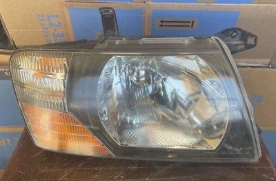 2001 年 2002 三菱 MONTERO 车头灯乘客右头灯 MR551959 — 第 1/4 张图片